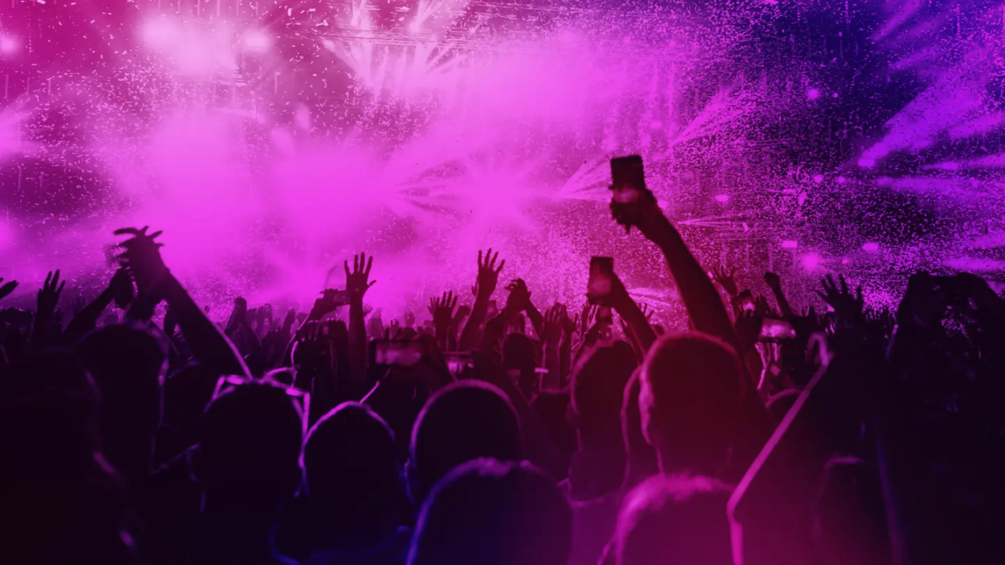 Concert crowd with purple lighting